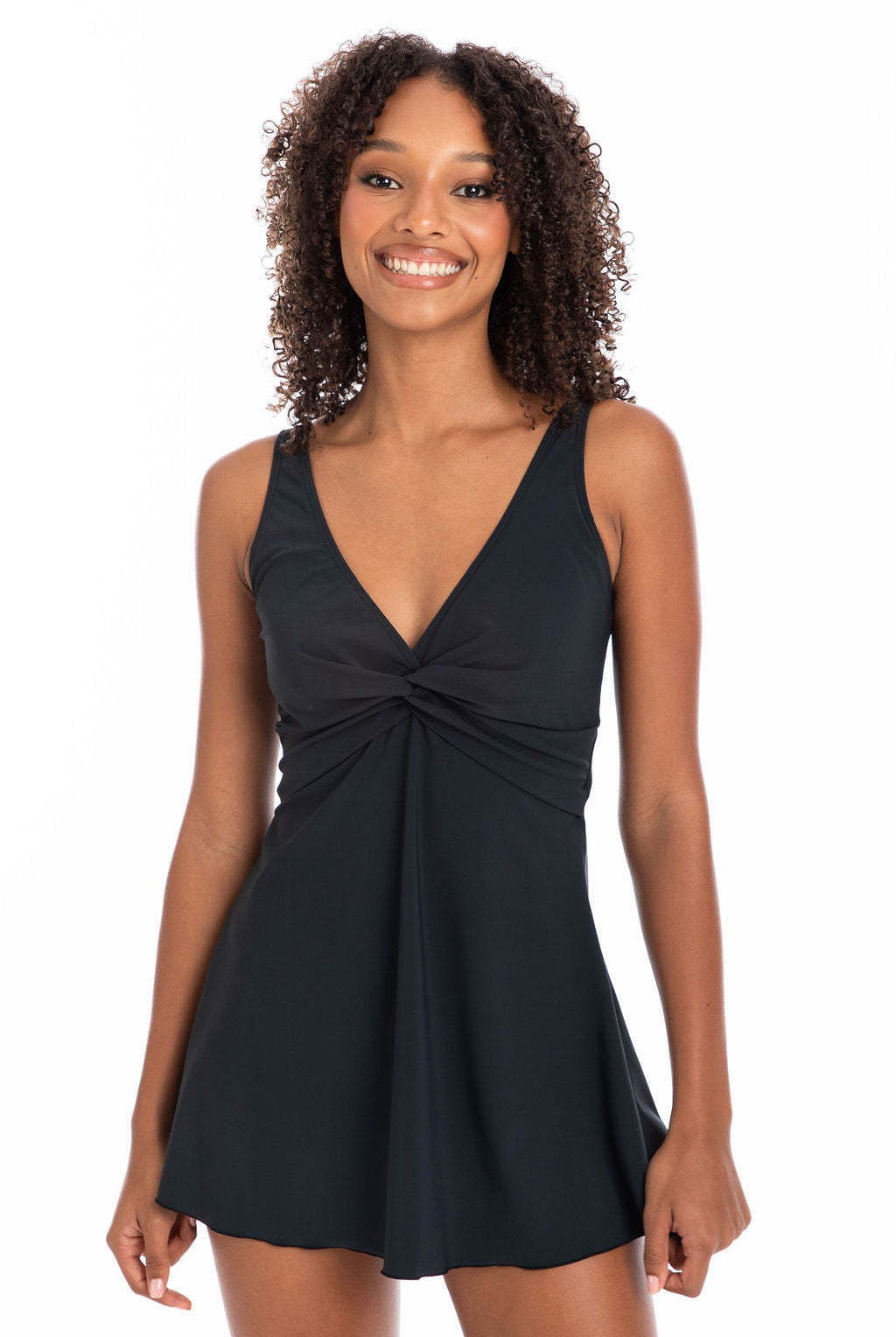 Woman wearing a black twist front swimdress with an A-line skirt